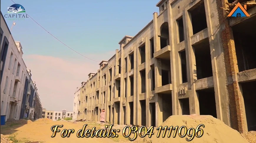 Harmony Park villa apartment blocks — construction progress showing structural shells and façade work