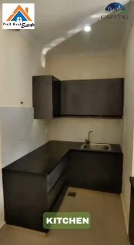Harmony Park apartment kitchen — modular cabinets