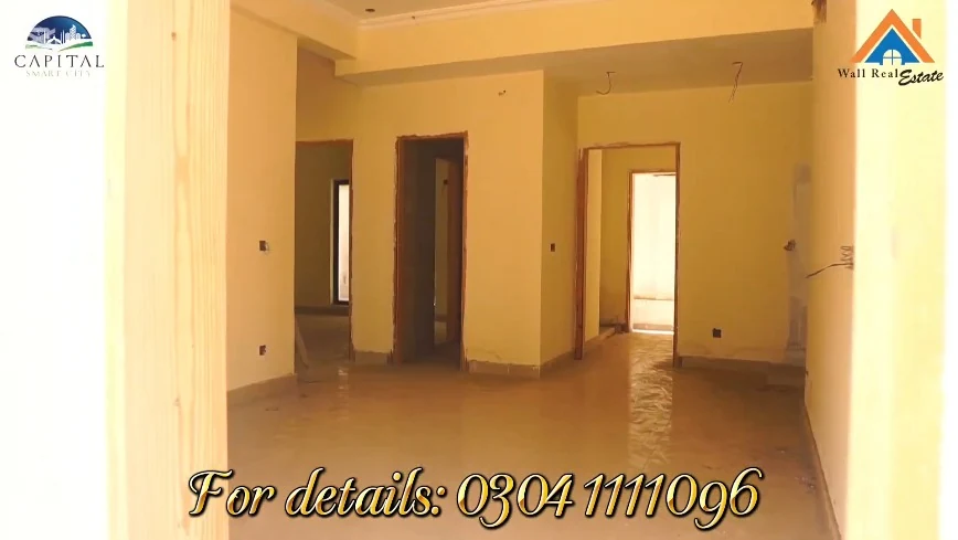 Harmony Park villa apartment interior — open-plan living/dining room with natural light
